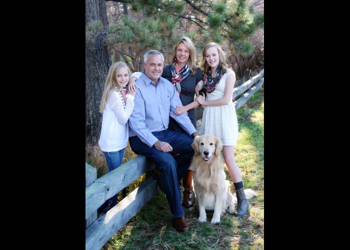 21-family_dogs_pets_golden_kids_teens_colorado_green_fall_leaves_fence.jpg