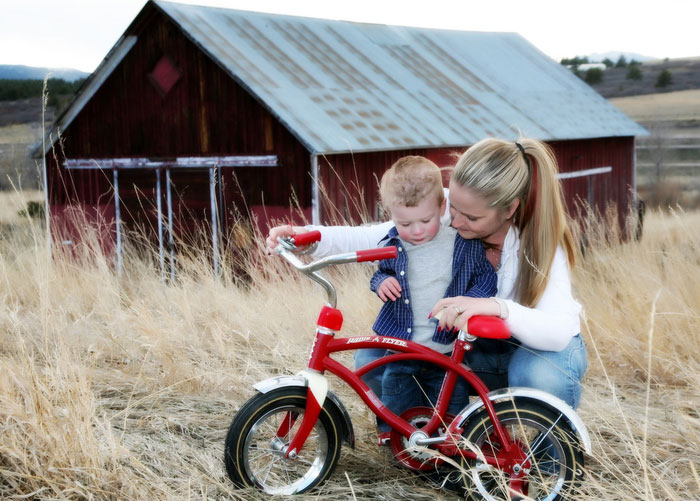 mom_son_bike_barn.jpg