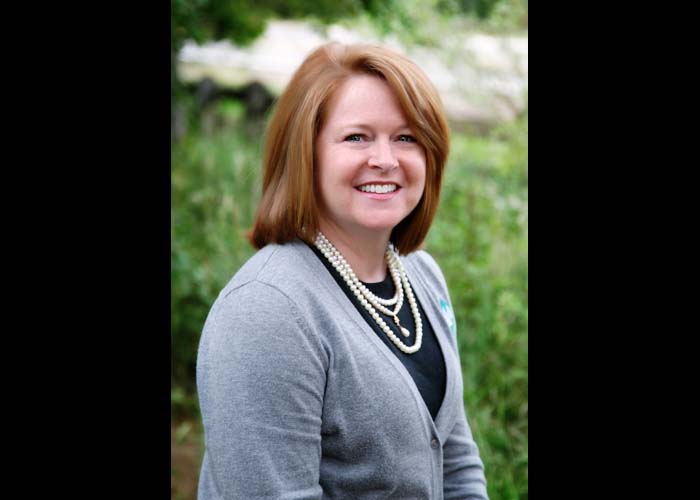72-dentist_staff_office_website_red_hair_blue_yellow.jpg