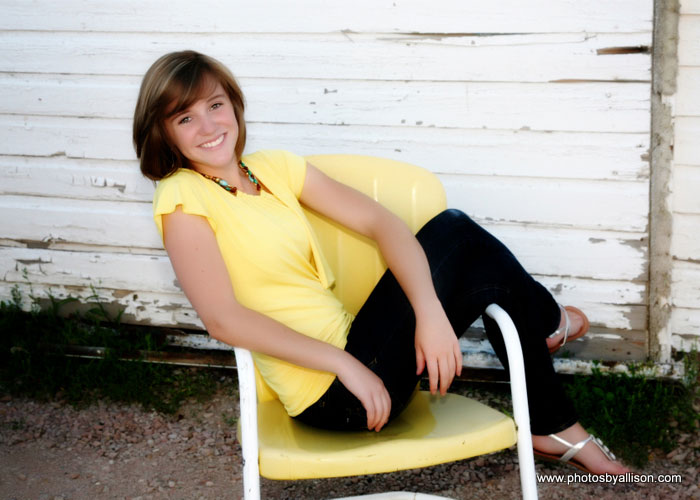 senior_girl_yellow_shirt_chair.jpg